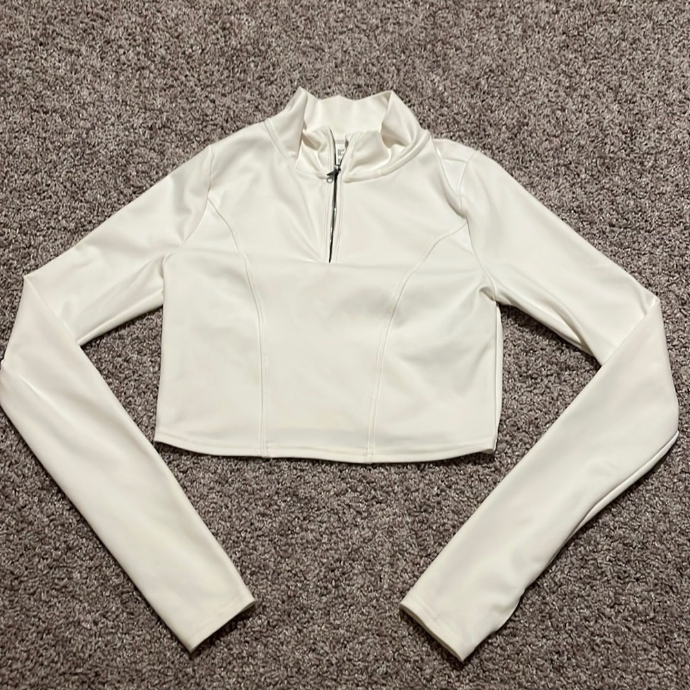 white xs gilly hicks athletic zip top, soft stretchy material